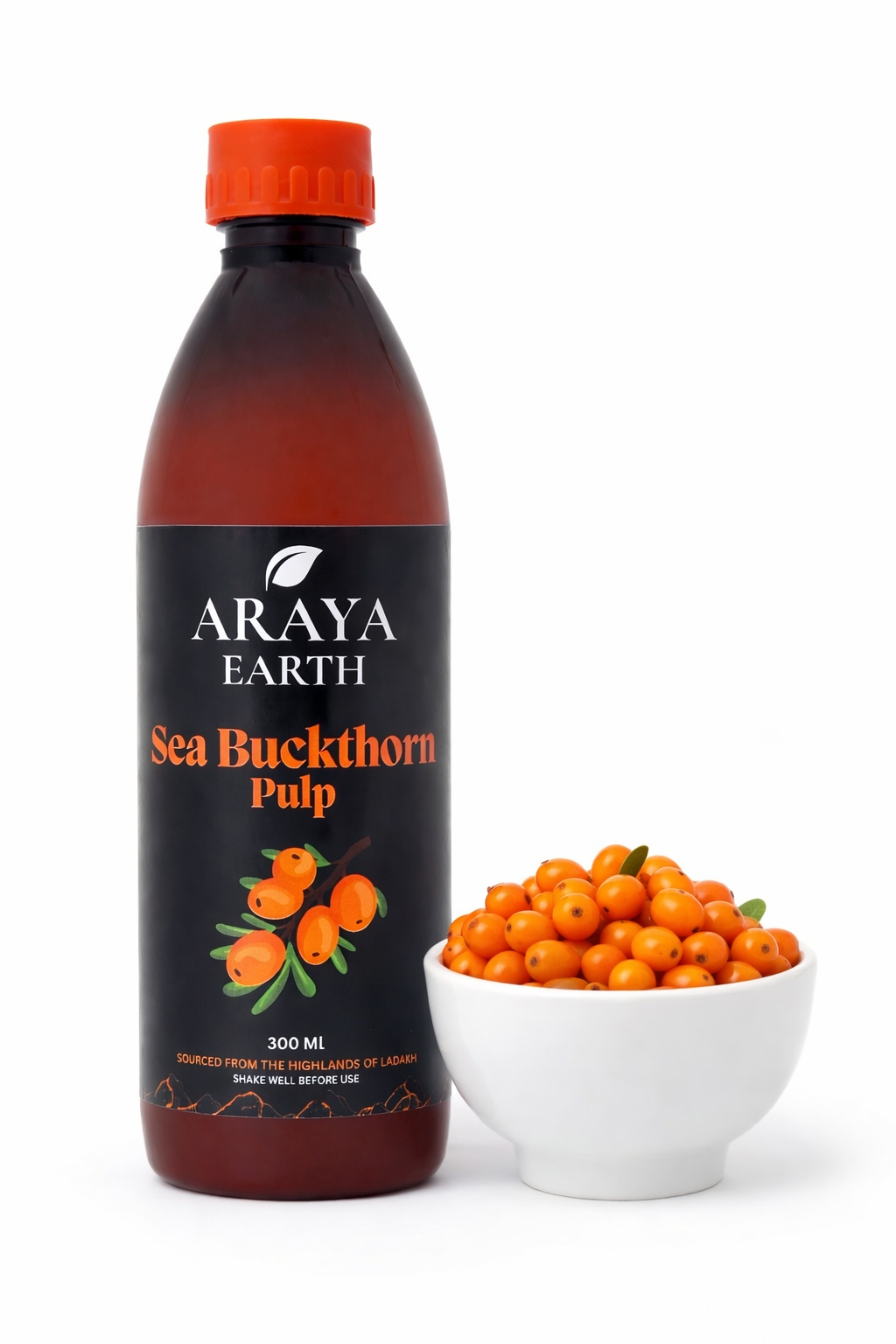 Bottle of Araya Earth Sea Buckthorn Pulp with sea buckthorn berries on a white background